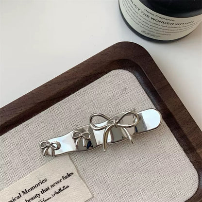 Natalie Silver Bow&Heart Clip